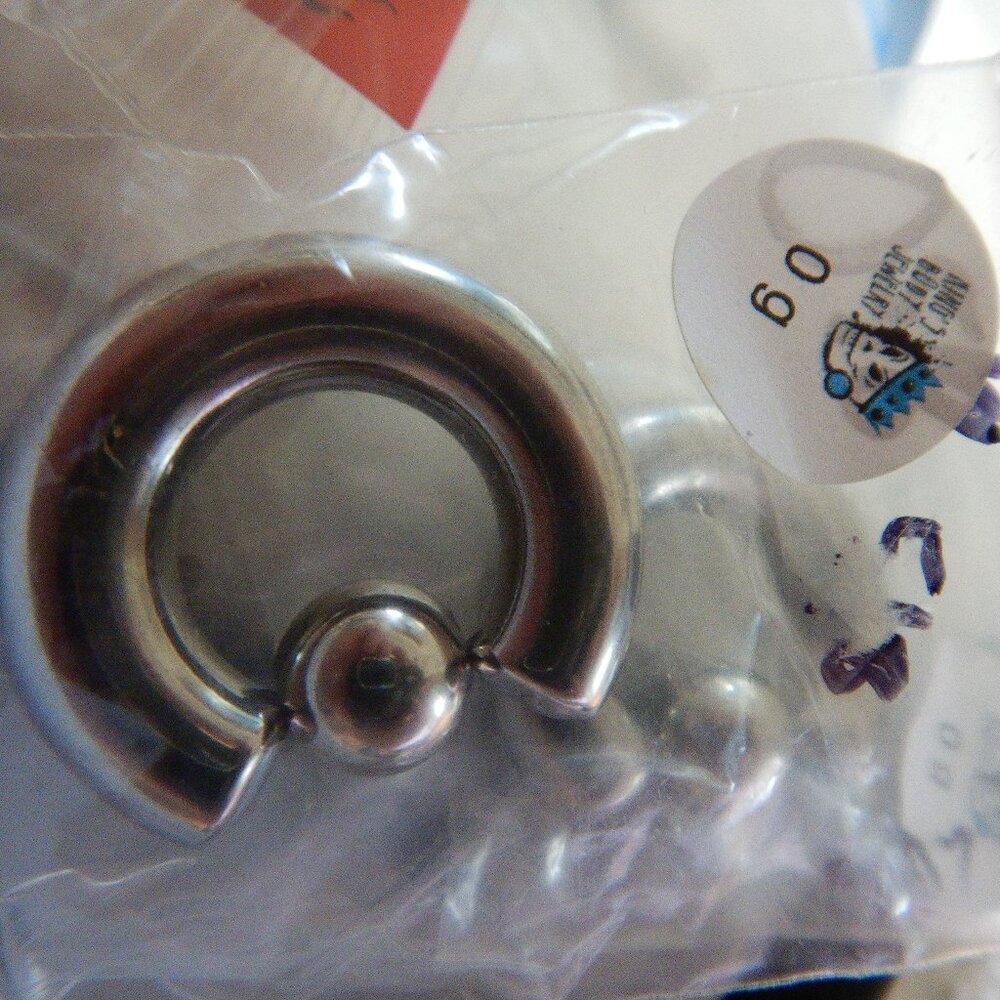 0g captive bead rings/gauges/body jewelry